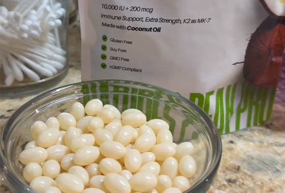 D3+K2 softgels in a bowl with product packaging